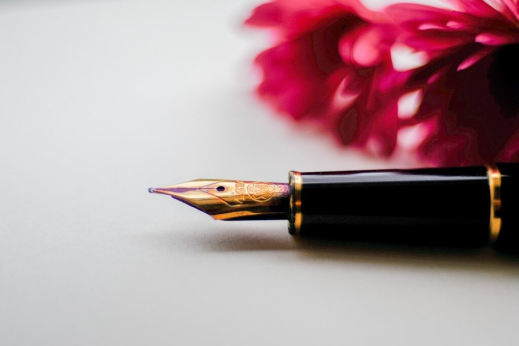 Fountain pen and stationery for a thoughtful book gift inscription